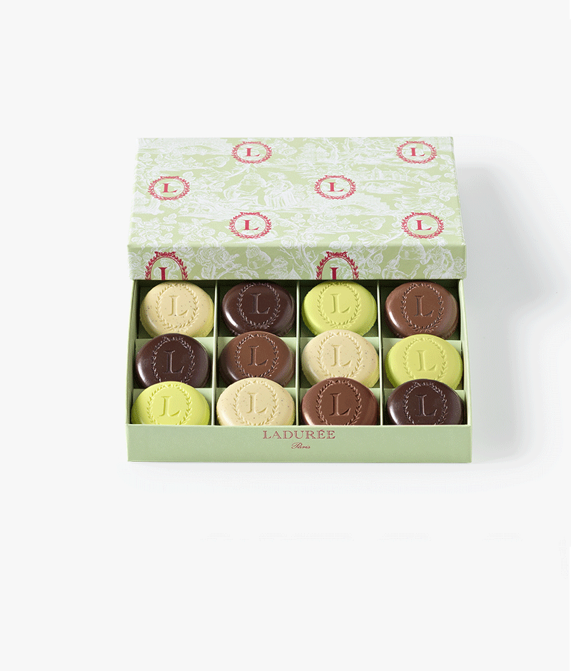 A box of 12 Eugenie gourmet assortments: chocolate, pistachio, caramel and vanilla.