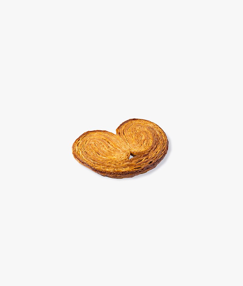 Le palmier: a crisp pastry with a buttery, caramelized flavor. All pastries are served with a small napkin.